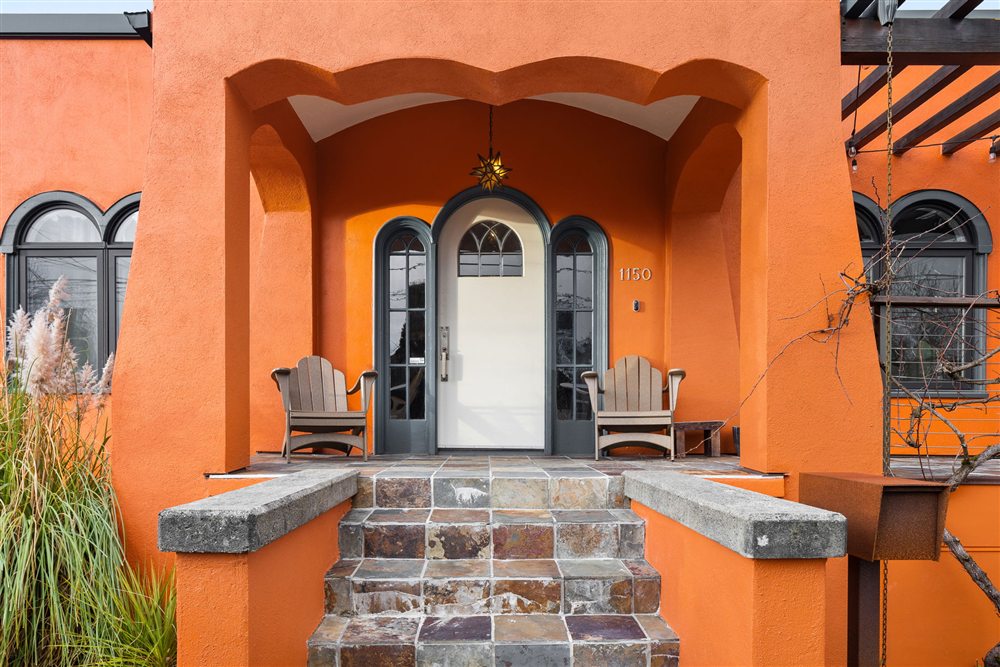 Arched front entry of the Mediterranean-style bungalow